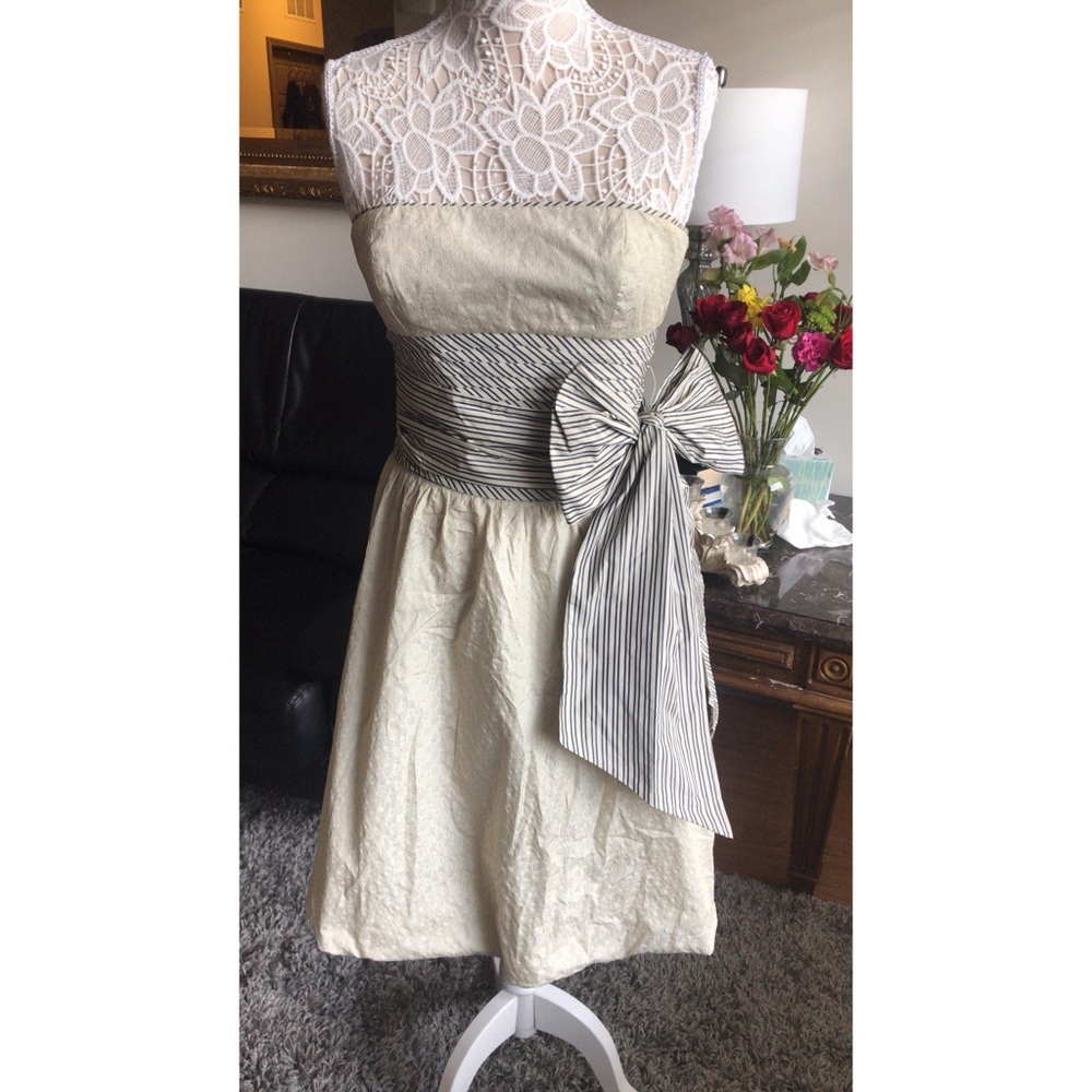 BCBG MAXAZRIA strapless dress.